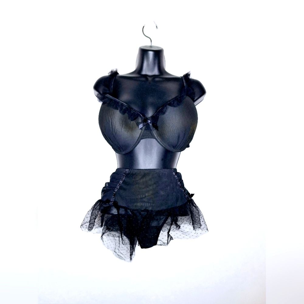 Plus-size skirted and laced dark academia bra and panty set.